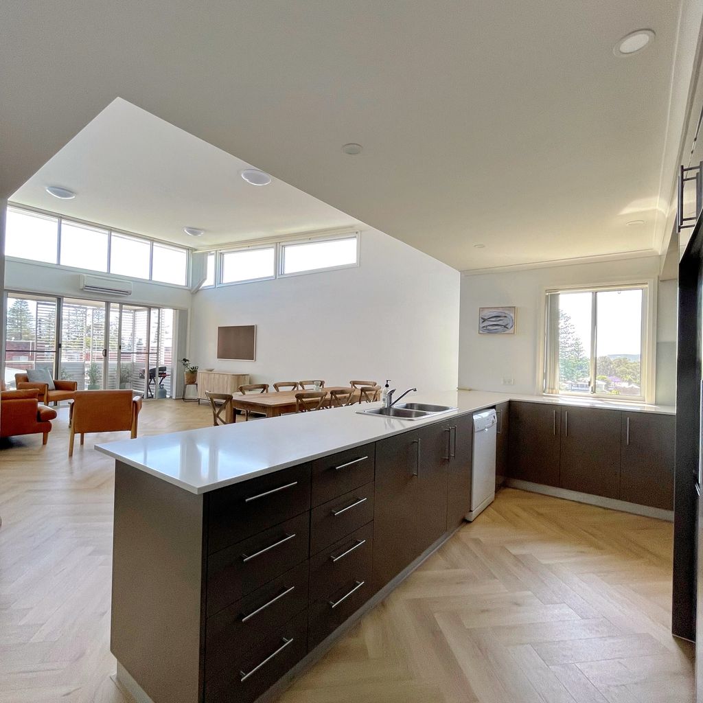 Kitchen with view of cape through the window.