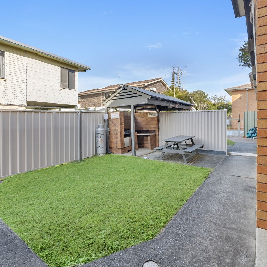 Shared BBQ area and yard.