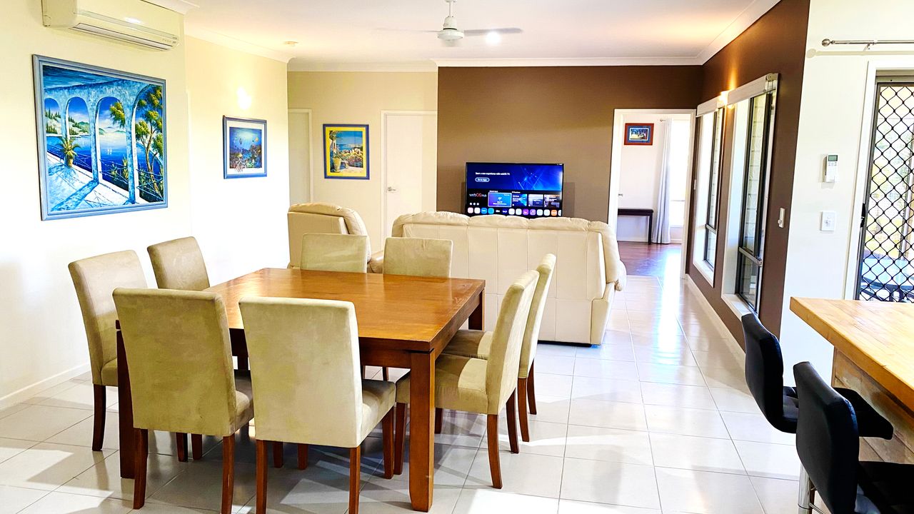 Behold the seamless fusion of functionality and style in our living room, kitchen, and dining area—a panoramic view that captures the heart of your home. The open layout allows for fluid movement between spaces, creating an expansive atmosphere of warmth 