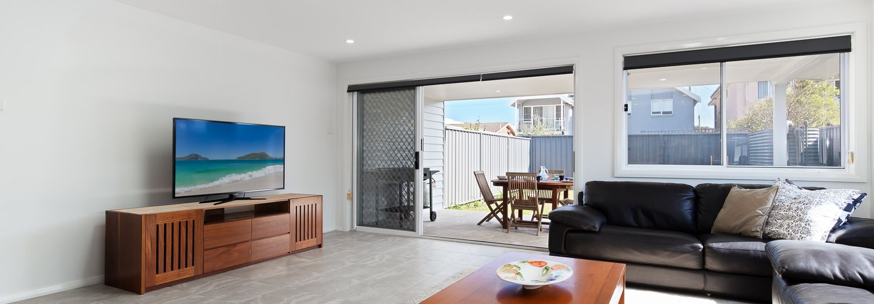 Birubi Breezes, 2/7 Fitzroy St – Large Duplex with Air Conditioning, WIFI & only 5 minute walk to the beach