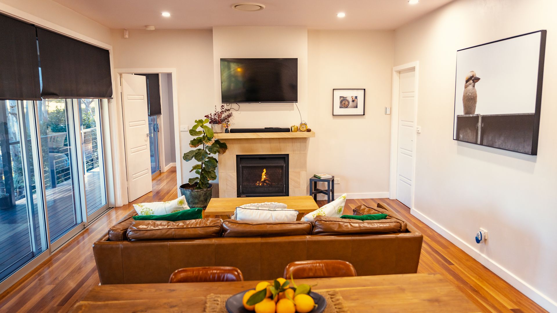 Lounge room with fireplace and flatscreen TV