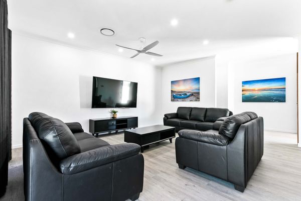  Experience both aesthetic beauty and cozy comfort in the living room, where stylish design meets ultimate relaxation.