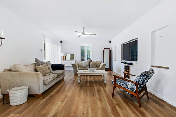 Step into our inviting and cozy living room, where warmth and comfort embrace you at every corner. Sink into plush sofas, gather around the crackling fireplace, and create unforgettable moments in the heart of our home