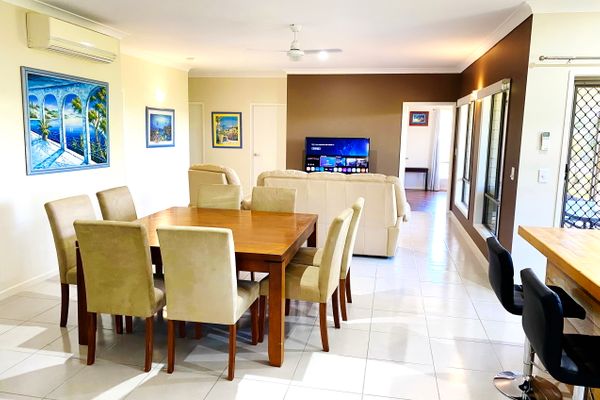 Behold the seamless fusion of functionality and style in our living room, kitchen, and dining area—a panoramic view that captures the heart of your home. The open layout allows for fluid movement between spaces, creating an expansive atmosphere of warmth 