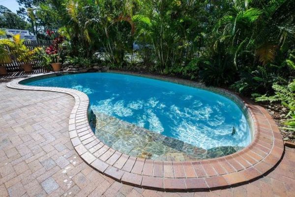 Dive into relaxation at our inviting pool—a refreshing oasis where the sun dances on crystal-clear waters.