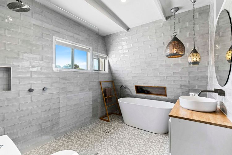 Immerse yourself in the sophistication of a modern bathroom, where every detail is curated for a luxurious and refreshing experience.