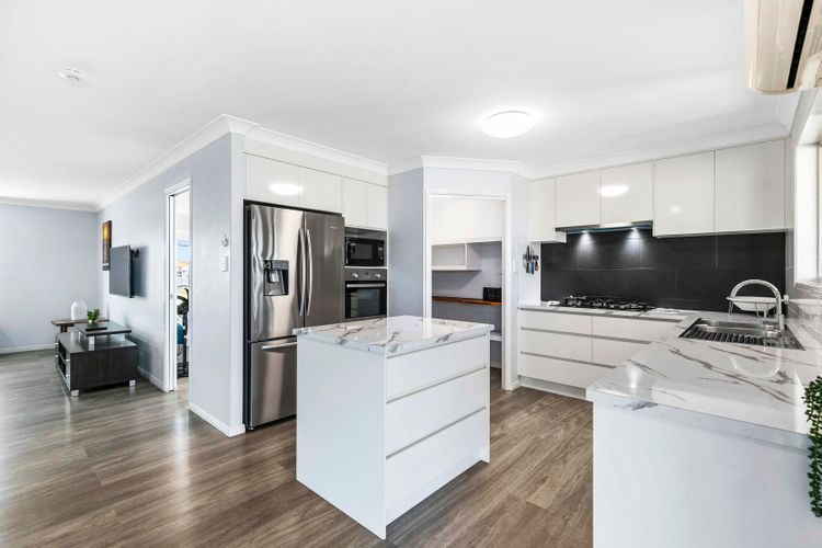 Experience culinary elegance in our modern and organized kitchen—a perfect blend of style and functionality.