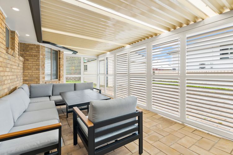 Step outdoors to find the enclosed Queenslander-style entertainment area,
