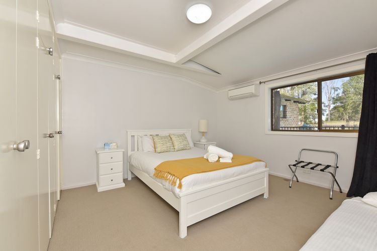 Bedroom with queen bed and aircon!