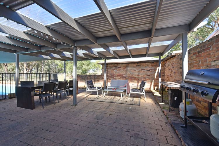 Amazing outdoor seating area with BBQ and pool!