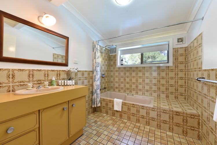 Bathroom with combined shower and bathtub