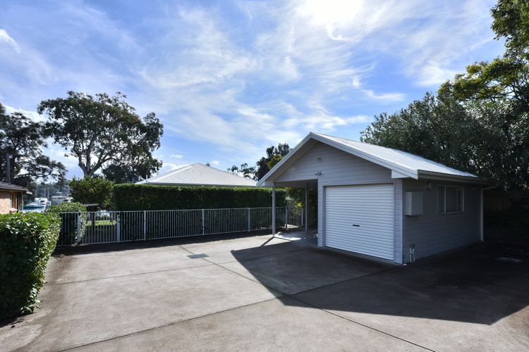 Carport, garage  and driveway