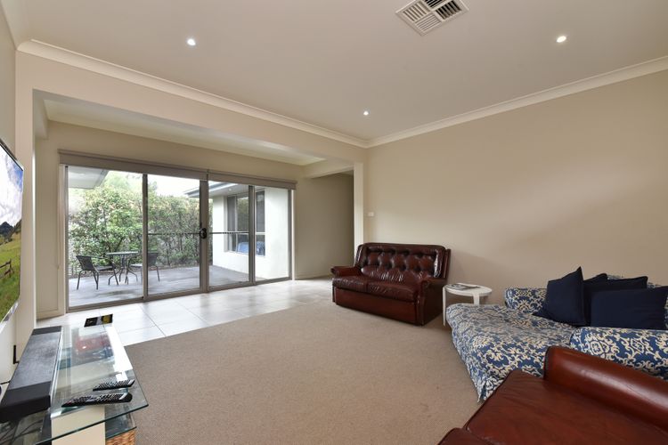Loungeroom with backyard patio access 