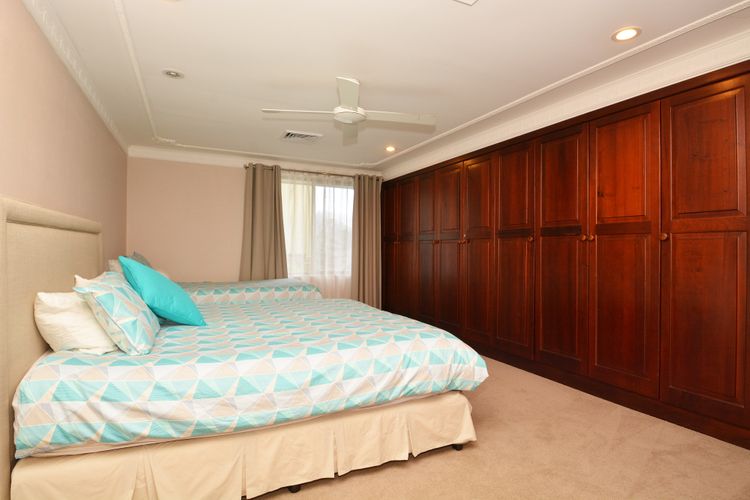 Bedroom with king bed and 1 single bed