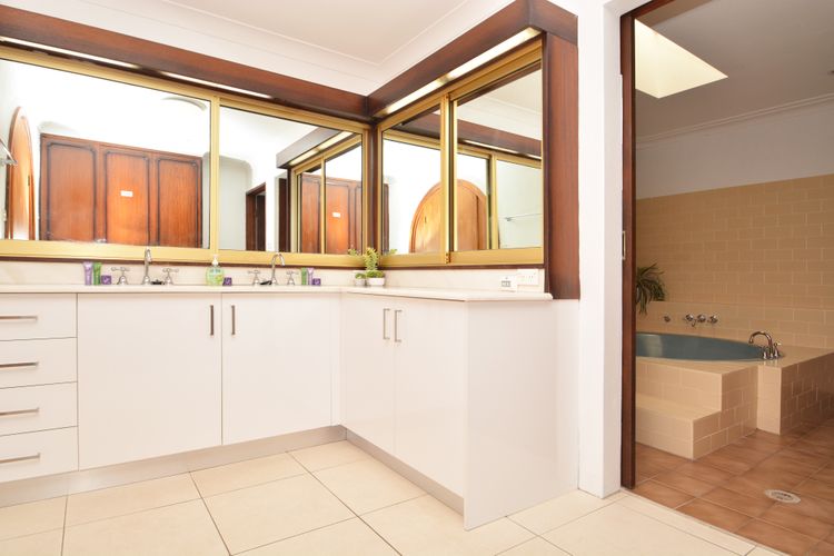 Main bathroom with large bathtub