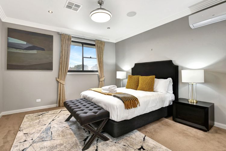 Luxe Bedroom with Queen bed and aircon