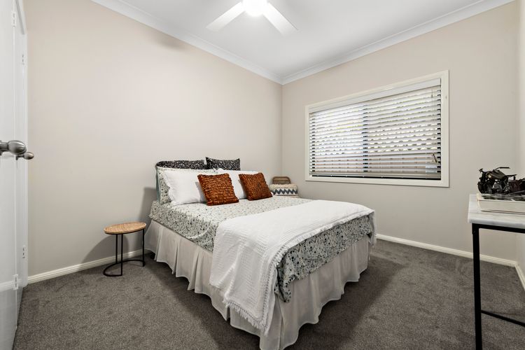 Bedroom with double bed and ceiling fan