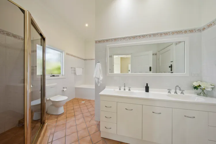Large bathroom with shower and bathtub 