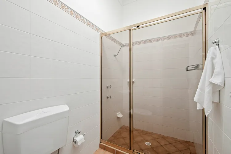 Spacious shower and toilet