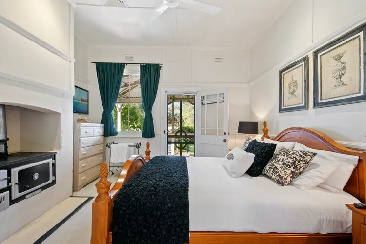 Bedroom with king size bed and ceiling fan