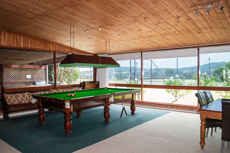 OMG! Game On: Living Room Oasis with a Stylish Pool Table