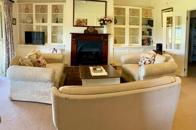 Relax and Unwind: Cozy Lounge with Fireplace