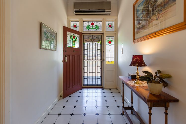 Creative space with the front door and Hallway Room