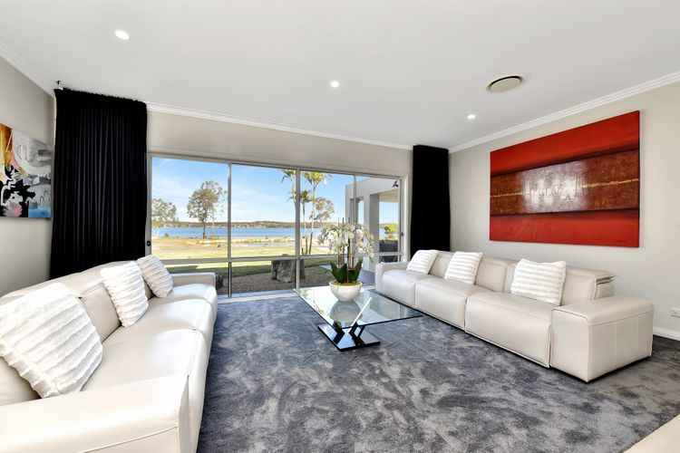 Lake Palm Resort Luxury Retreat absolute Waterfront on 3 acres at Lake Macquarie.