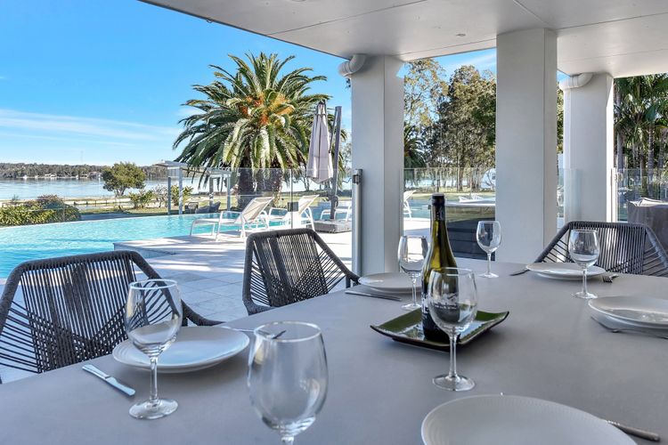 Lake Palm Resort Luxury Retreat absolute Waterfront on 3 acres at Lake Macquarie.