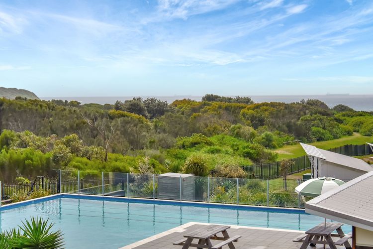 Palm Breeze at Caves Beach Villas sleeps 5