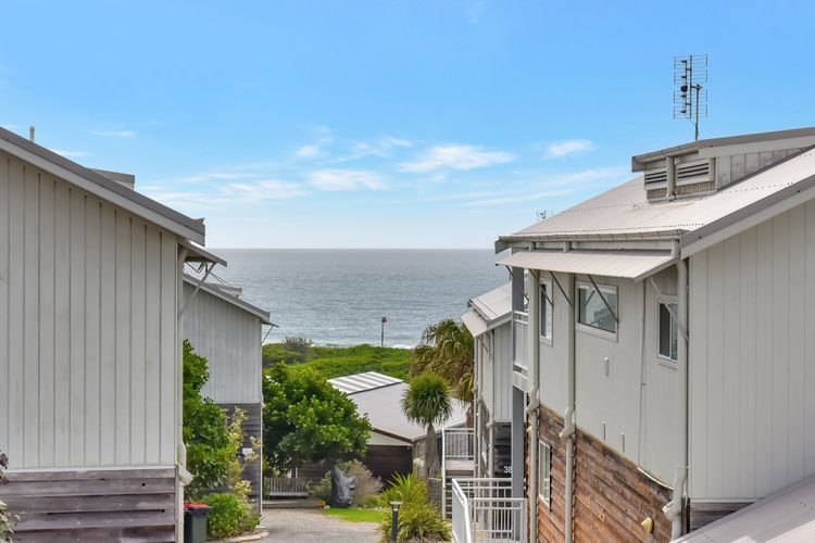 Palm Breeze at Caves Beach Villas sleeps 5