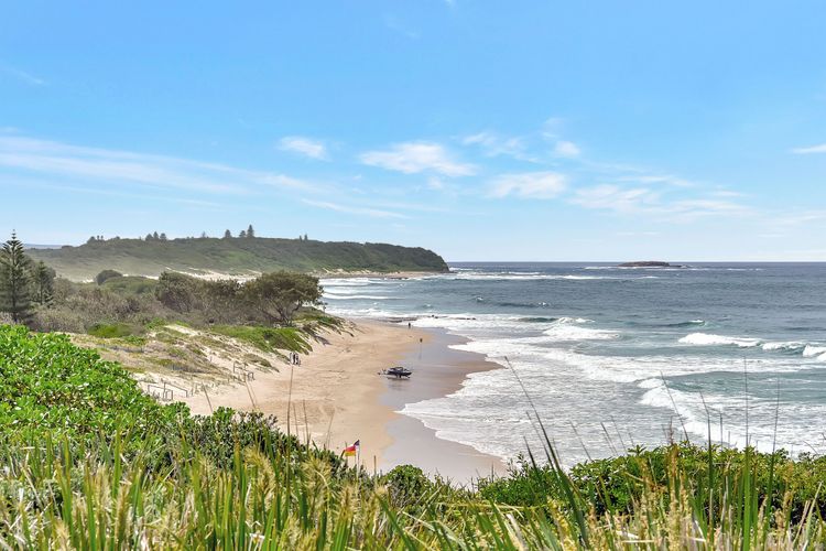 Palm Breeze at Caves Beach Villas sleeps 5