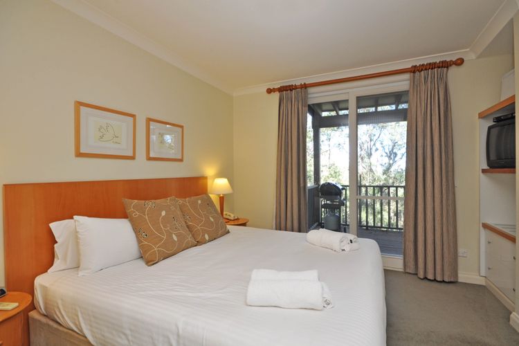 Bedroom with balcony views 