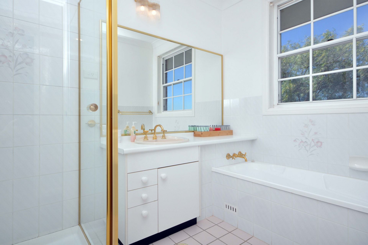 Bathroom with shower and bathtub 