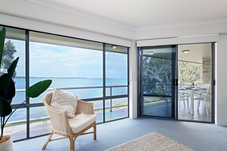 Pelican Sands, 3/83 Soldiers Point Rd – stunning waterfront unit with magical water views & air conditioning