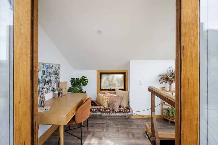 Unwind in this cosy study nook, where you can sit and read a book. This is located up stairs. 