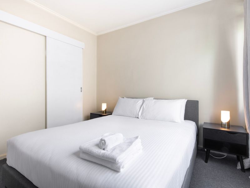 Bedroom equipped with fresh towels and linens for your comfort