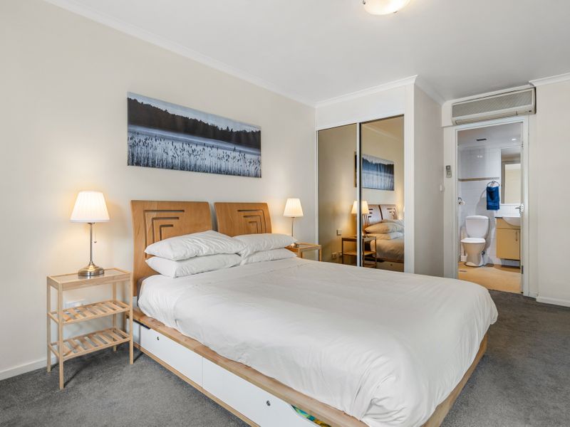 Spacious & Relaxing – A well-designed bedroom with storage space and a calming colour palette.
