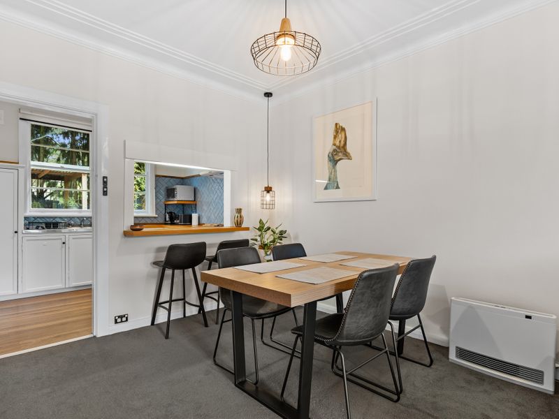Tasteful decor and natural light brighten the spacious dining area.