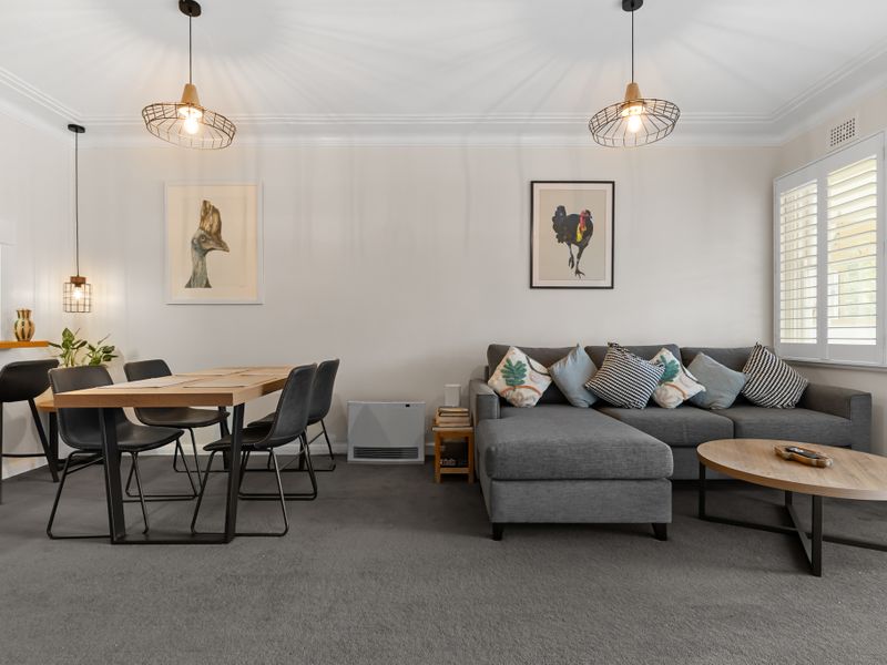 Relax in this stylish lounge area with natural light.