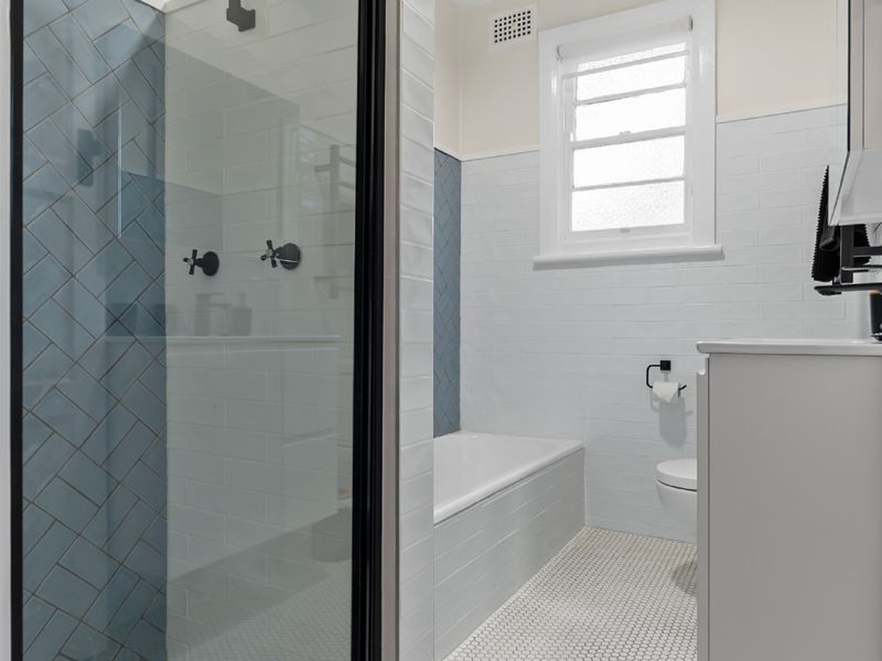 Modern shower and bath combo.