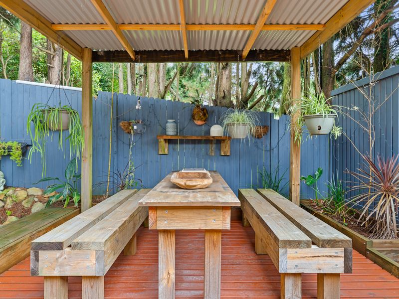 Relax and unwind in the outdoor dining area, perfect for enjoying meals in nature.