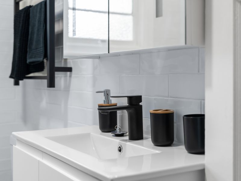 Contemporary vanity with chic decor.
