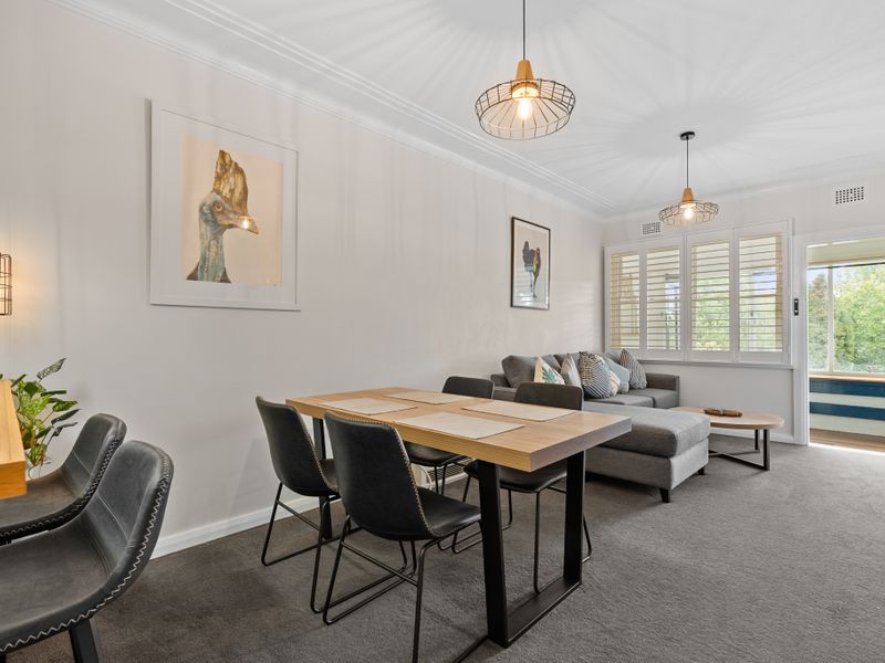 Relax in this stylish lounge area with natural light.