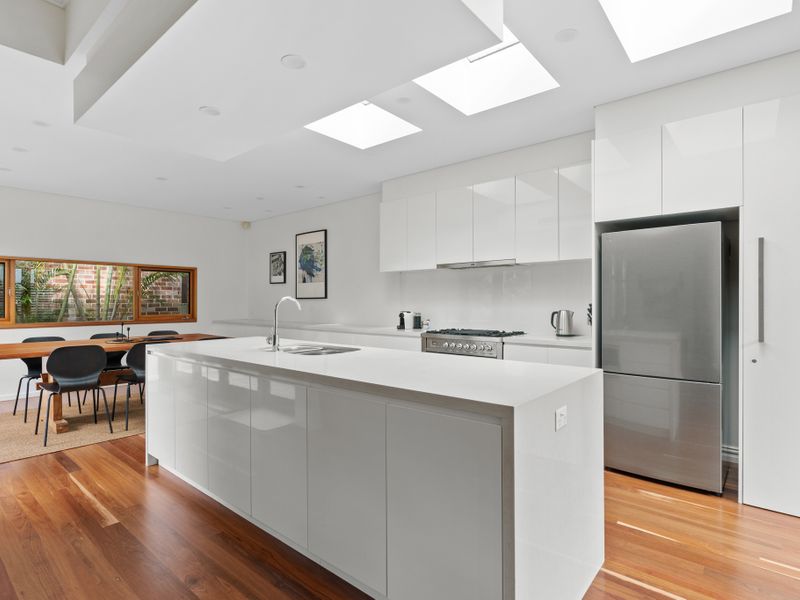 Spacious and Bright Living Room – Relax and unwind in this stylish, sun-drenched living area.