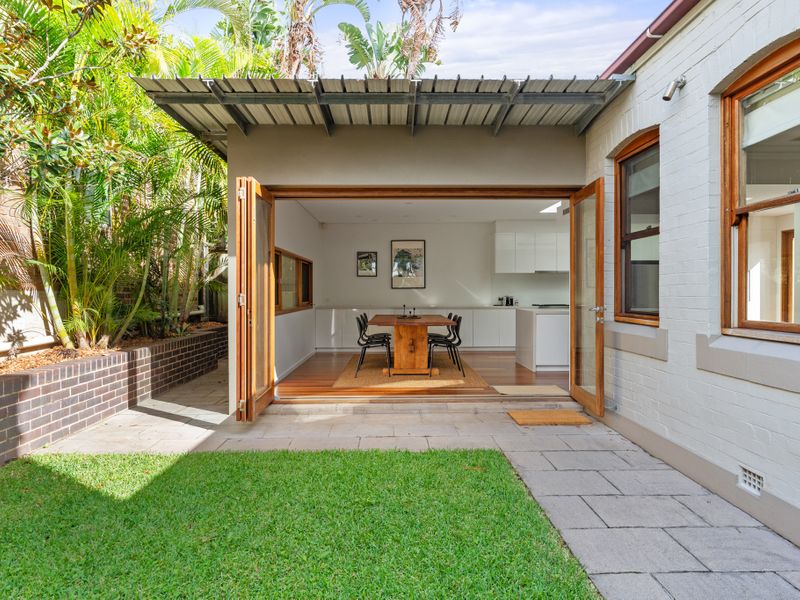 Bright and spacious living area with seamless indoor-outdoor flow. Perfect for relaxing or entertaining guests.