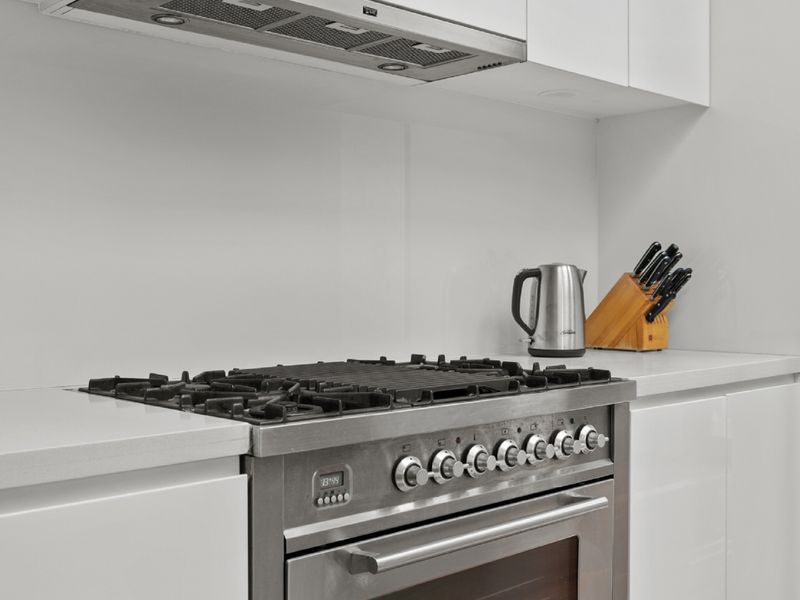 Cook like a pro in this well-equipped kitchen featuring a spacious oven and gas stove.