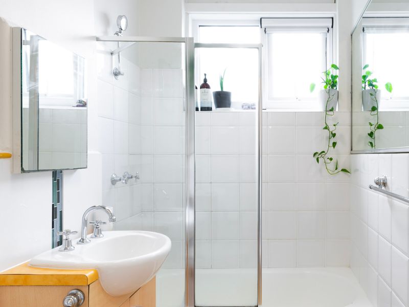 Clean bathroom with bathtub