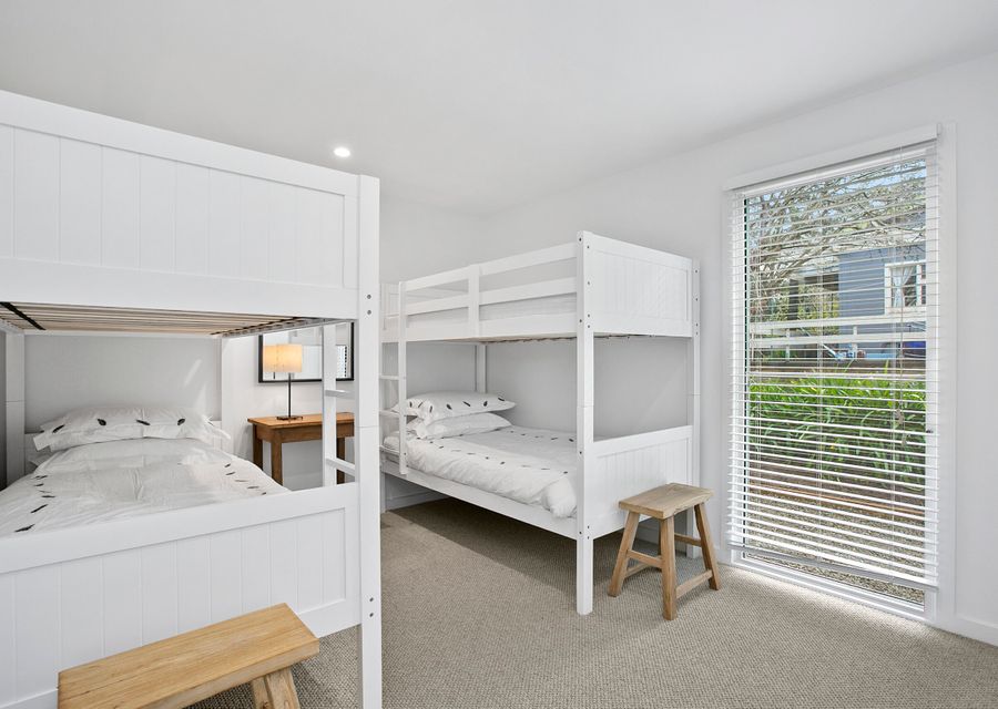 Bunk room with 4 single beds