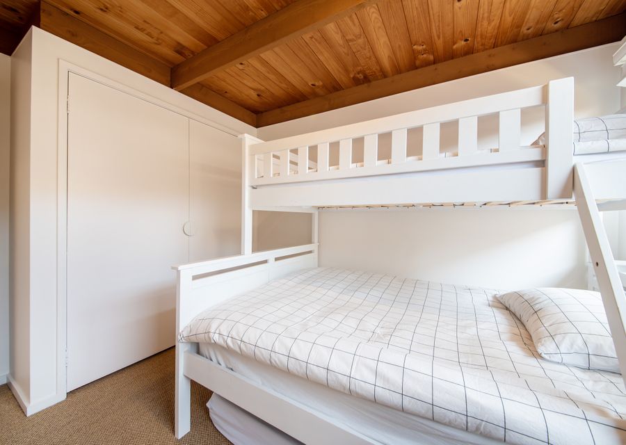 Bedroom three, with double bunk with single above and trundle mattress